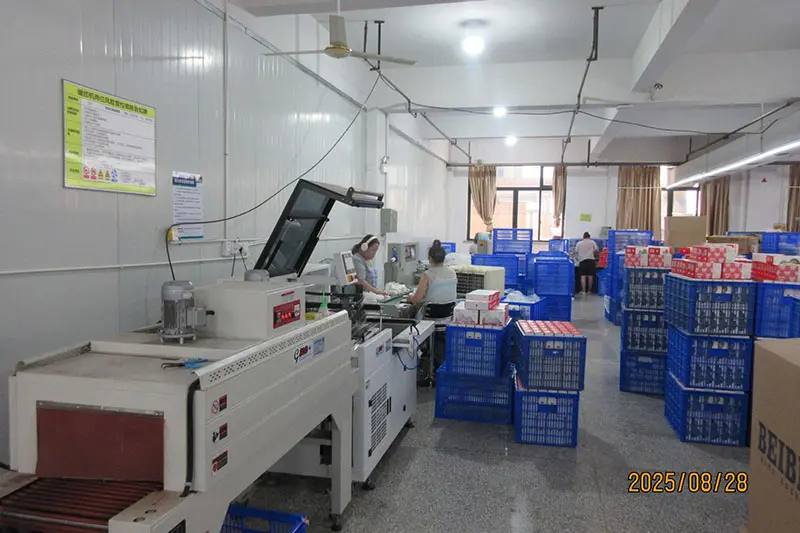 Custom sock packing area with labels bags and cartons