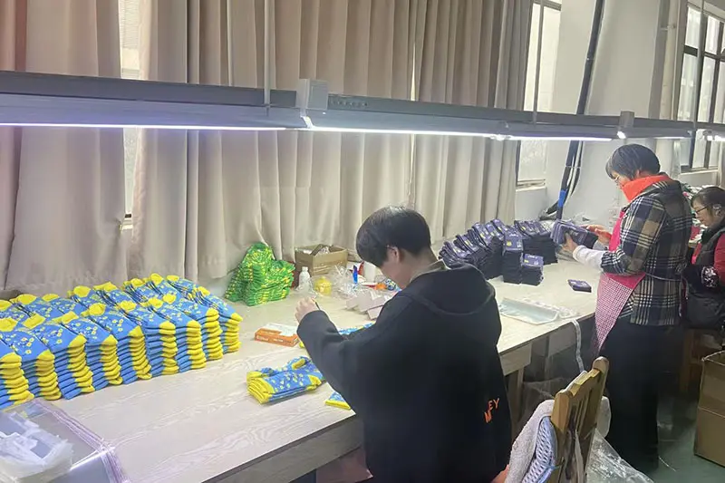 Final inspection for finished custom socks before packing