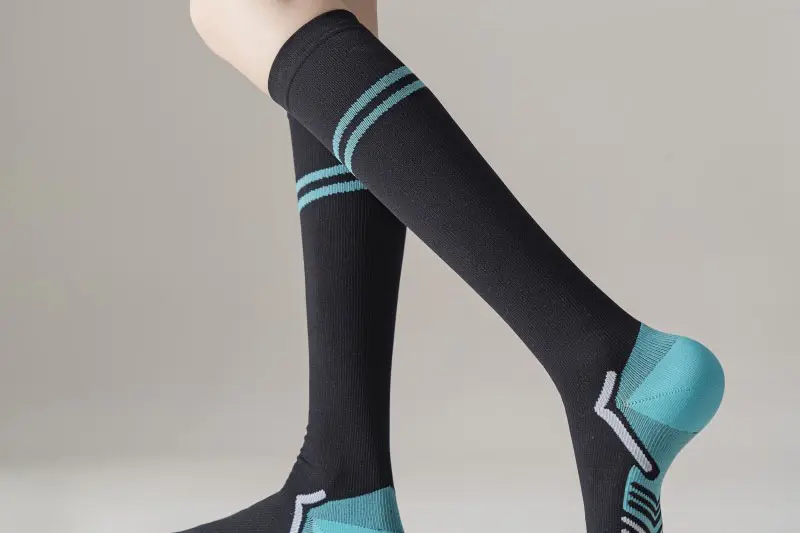 Compression sock project planning with fit stretch size logo and packaging notes