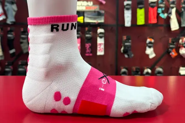 Final custom team sock direction with logo placement color blocks and packing notes