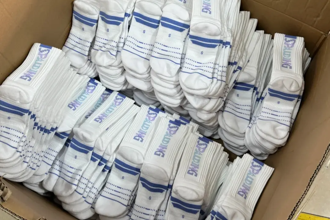 Sports team sock sample check before bulk production