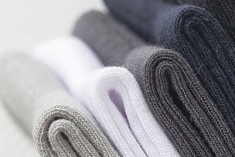 Comfort details for custom bamboo socks including weight texture and toe seam