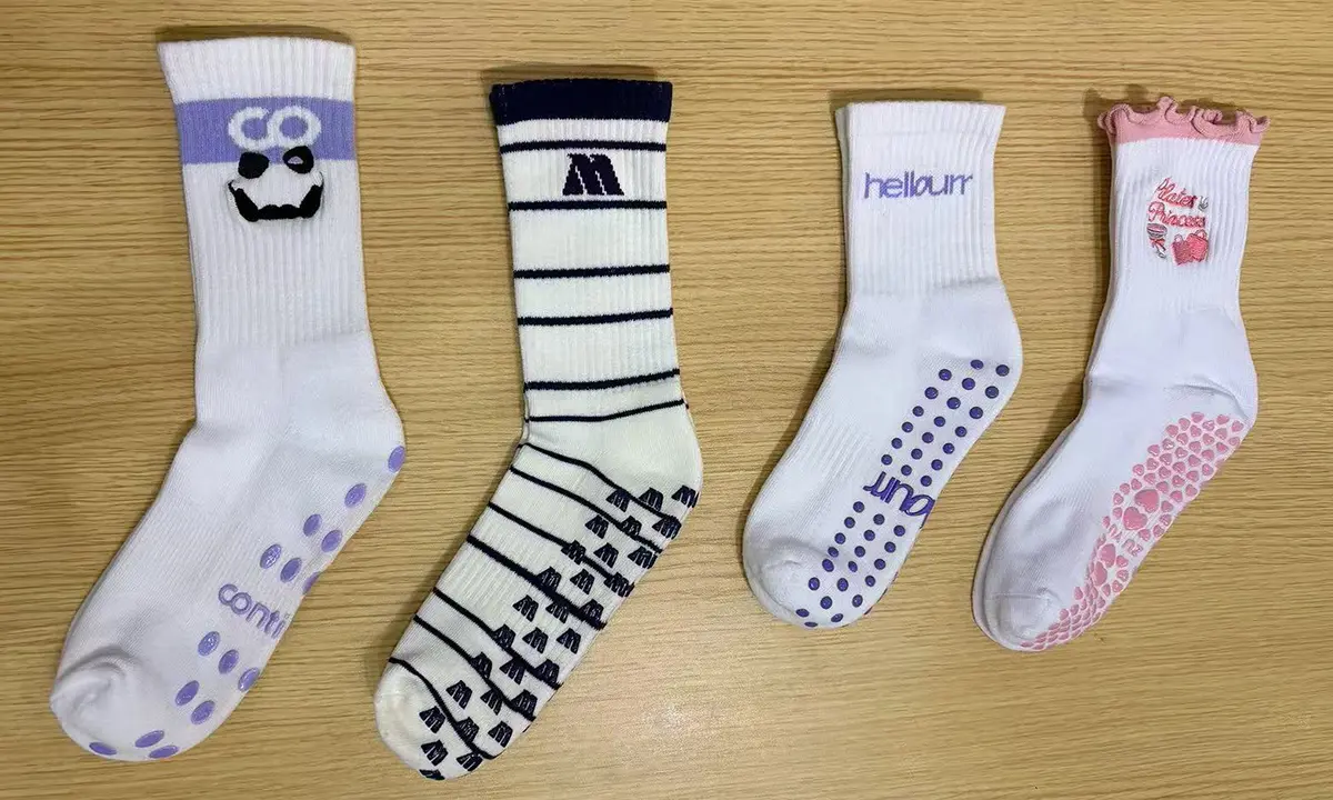 Custom grip sock samples for checking sole pattern fit and silicone color