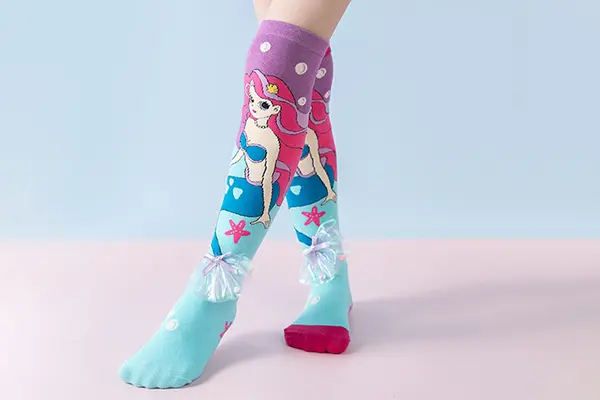 Custom themed graphic knee high socks with longer vertical artwork space