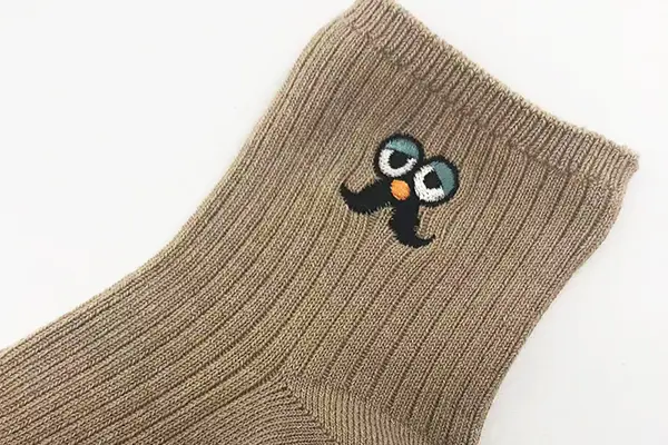 Ankle embroidery on socks
