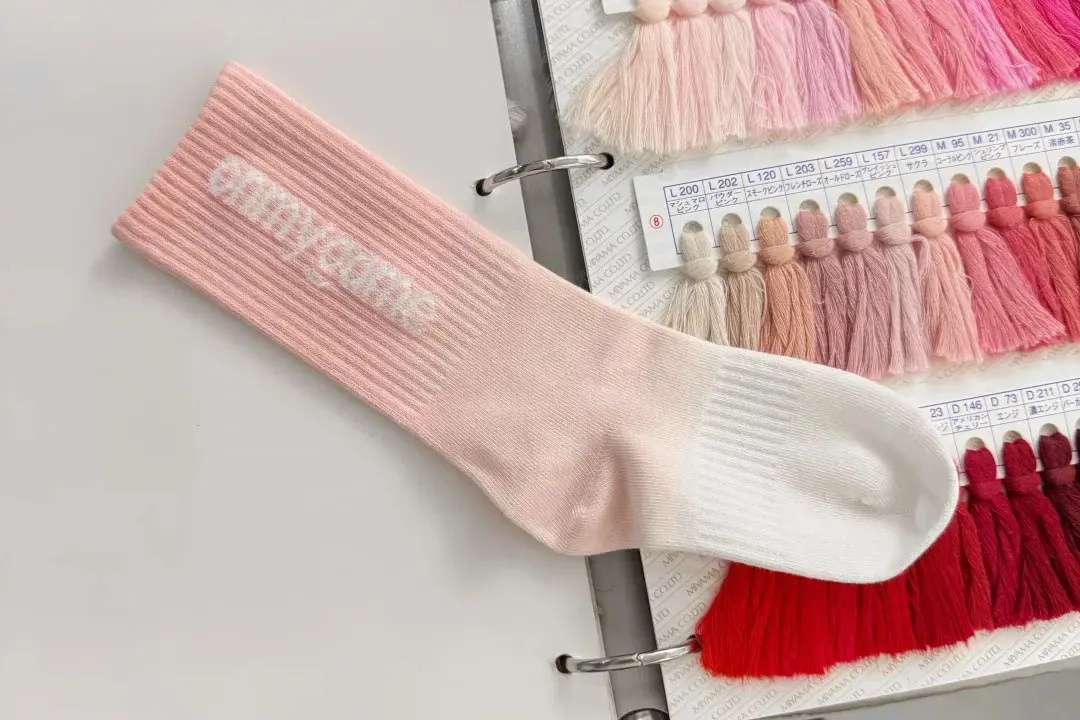 Foot top logo placement on custom socks