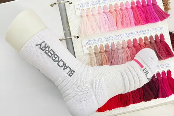 Spandex and elastic yarn for custom sock stretch and recovery