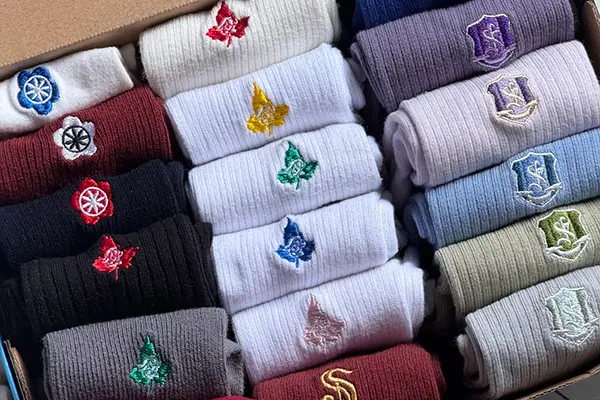 Custom logo socks prepared for corporate gift orders