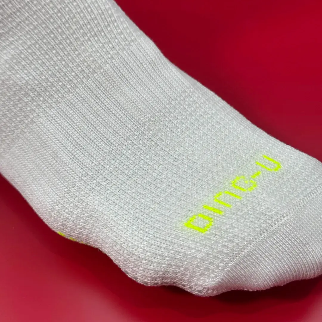 Custom running ankle socks with heel tab and low profile structure