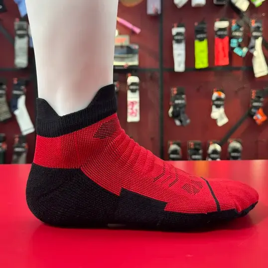 Breathable running ankle sock material and light cushion detail
