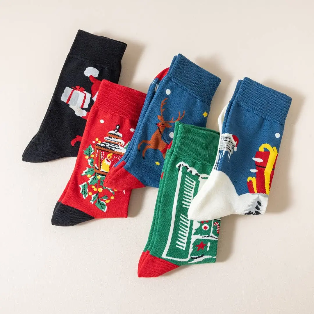 Dress style Christmas socks with subtle holiday patterns and gift packaging