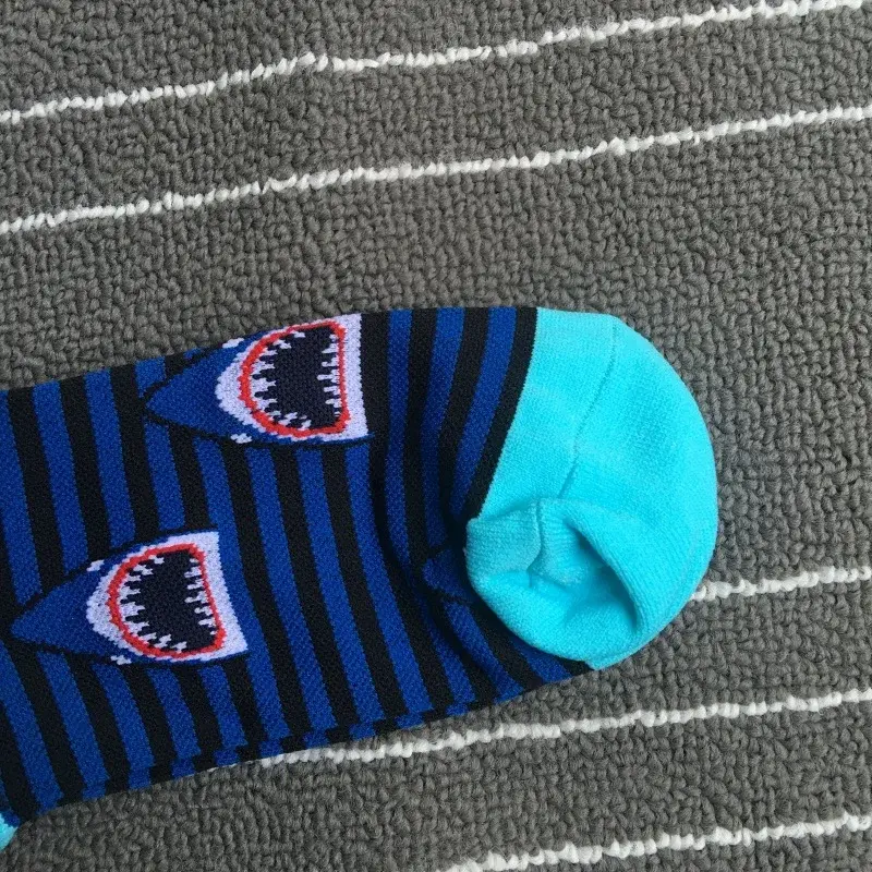 Custom over-calf socks with branded calf area and ribbed cuff