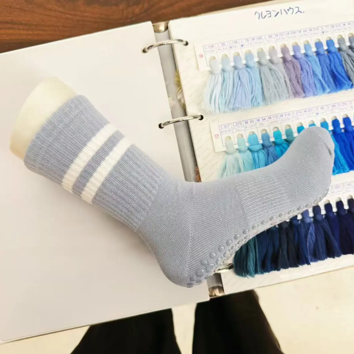 Custom barre grip socks with studio style and silicone sole pattern