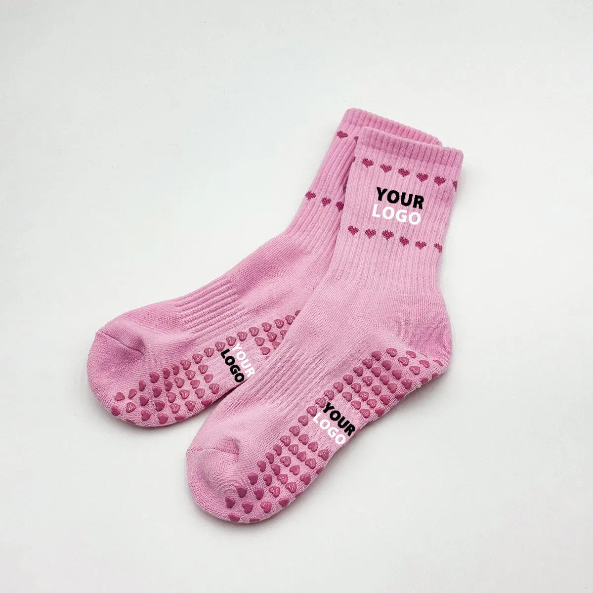Personalized Pilates grip socks for studios classes and retail programs