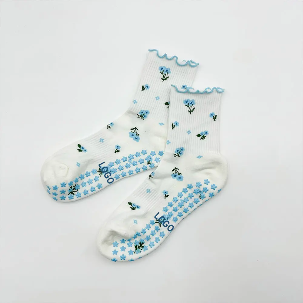 Custom studio grip socks in branded colors for retail programs