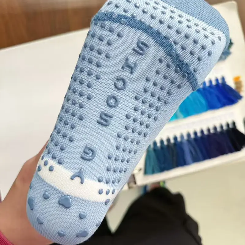 Personalized yoga grip socks for wellness brands and studio retail
