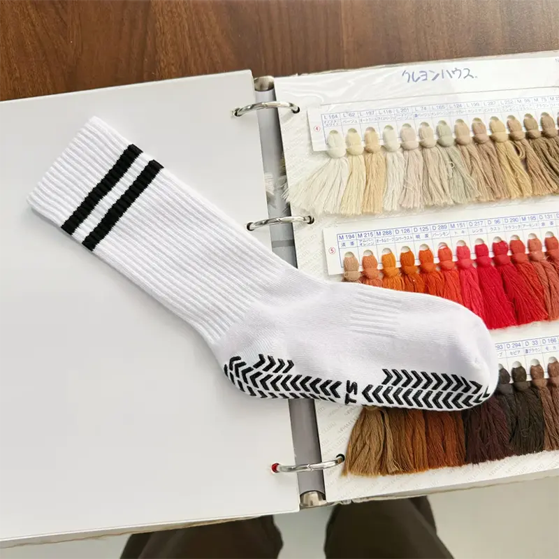Silicone grip sole detail for yoga studio socks