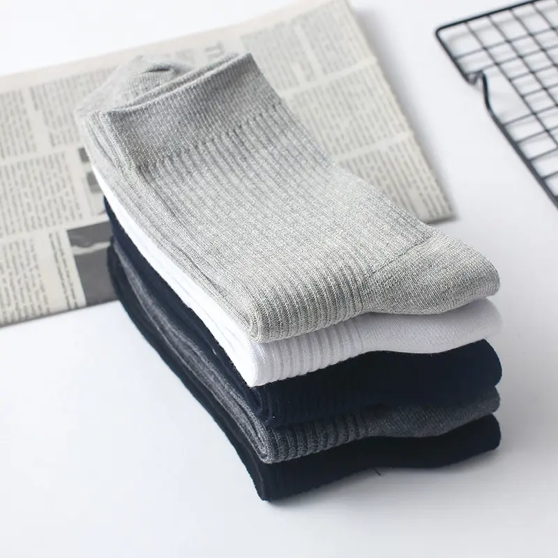 Custom dress socks with subtle logo placement and business colors