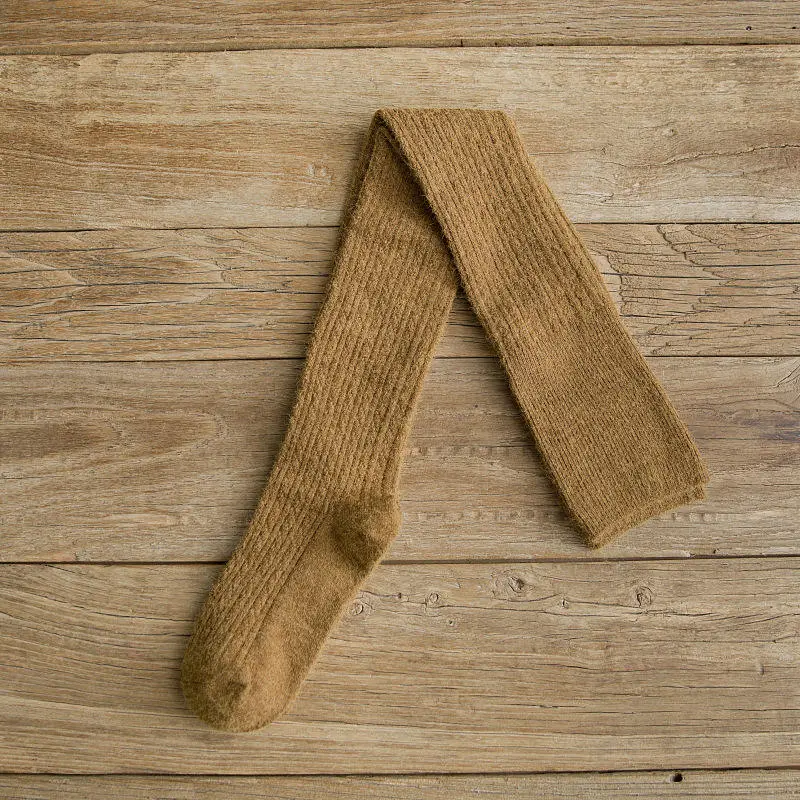 Thick merino wool blend boot socks with cushioned sole direction