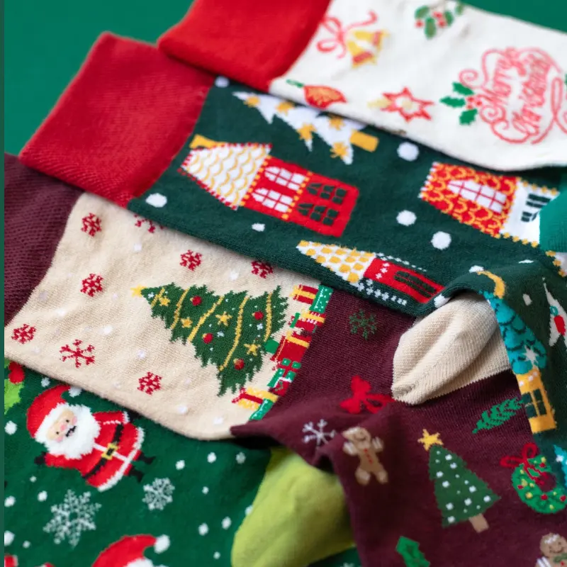 Holiday promotional socks with custom Christmas patterns logos and gift packaging
